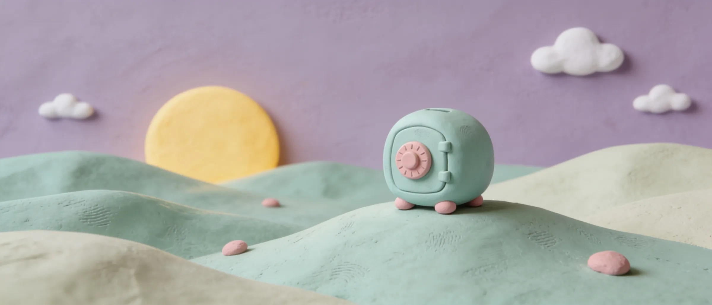 A calm clay landscape of rolling hills where the little safe sits contentedly.